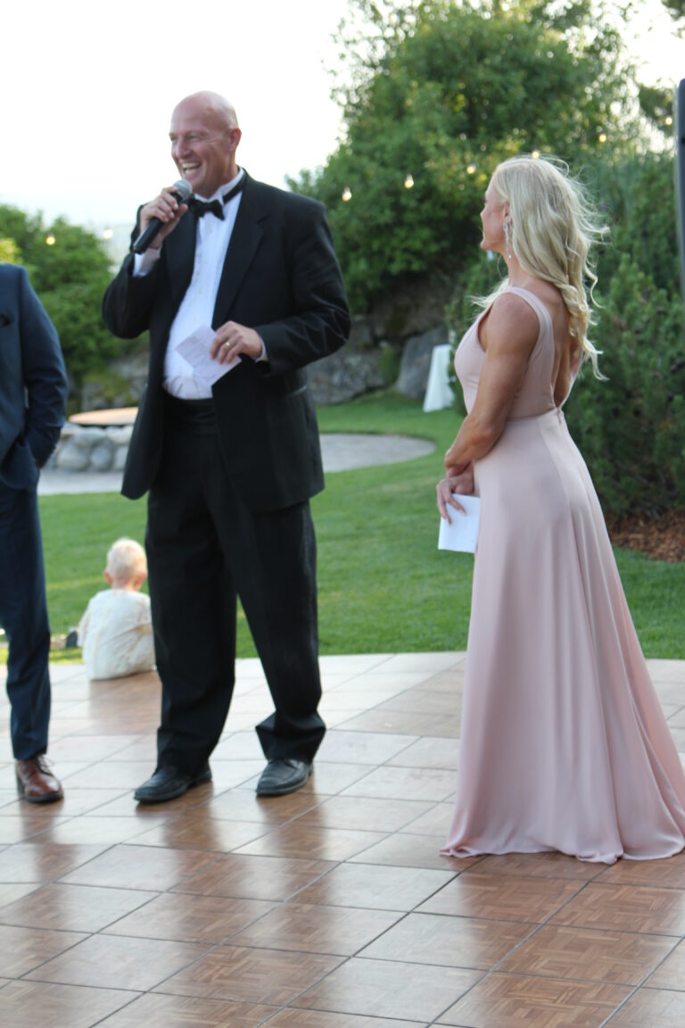 Wedding speech at A & B Productions outdoor celebration.