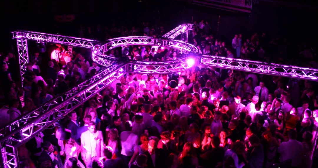 Event lighting and DJ equipment at A & B Productions, showcasing vibrant purple lighting